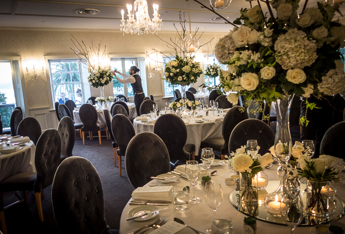 For a wedding at Dunbar House in Sydney's eastern suburbs, Susan designed these tall arrangements which included roses, hydrangea, pepper berry and jasmine. The arrangements were spectacularly shown off with mirrors and floating candles. Designed by Susan, and made, delivered, and installed by the Susan Avery team.