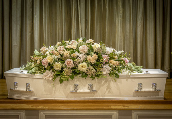 Peach Coloured Casket Roses for Sydney Funeral